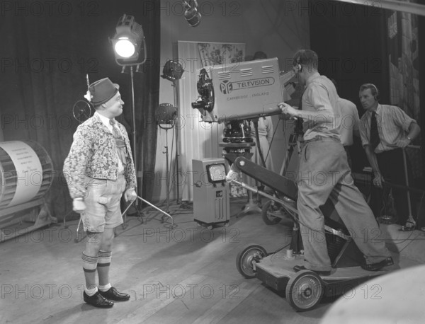 Television in the 1940s. Actor Max Hansen performing on televison 1948. A television broadcast