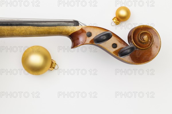 Top view close up shot of old violin and Christmas decoration. Flat Lay Image