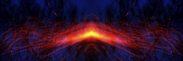From a glowing hot centre in shades of yellow and orange, bright red trajectories of sparks move