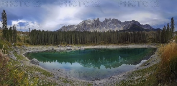 Karersee is located in the Latemarwald forest in the upper part of the Eggental valley, of the city