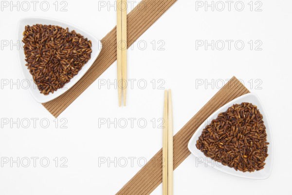 Top View Of White Sushi Plate With Rise And Chopsticks. Symmetry Food Design