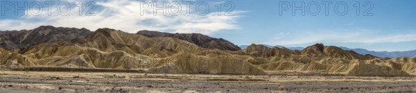 Scenic panoramic view of yellow colored mountains in the Death Valley NP, USA, North America