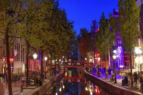 Night view of De Wallen, the famous red-light district with window prostitution in Amsterdam,