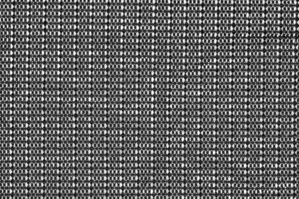 Black plastic fabric texture useful as a background