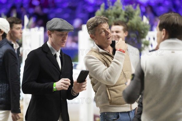 Daniel Coyle of Ireland inspects the course ahead of the 1.60m FEI Jumping World Cup at Jumping