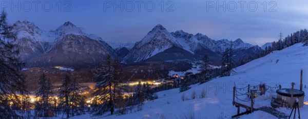 Evening mood, view from a hut with hot pot from Motta Naluns over Scuol towards Val S-charl,