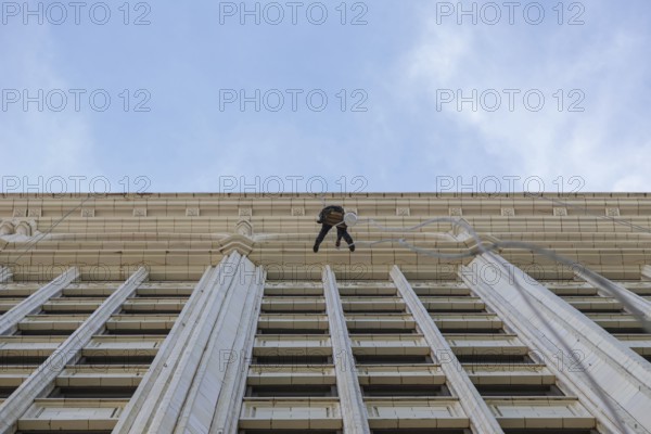 Window cleaner on a historic building facade in Chicago, IL, USA, Chicago, United States, North
