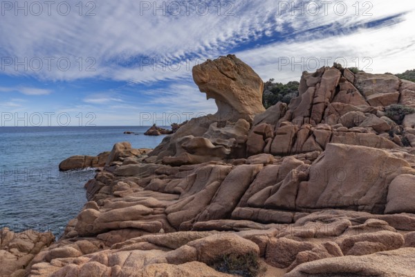 Coastal landscape with bizarre red rocks and sea view, Spiaggia di Cala E'Luas, Ogliastra,