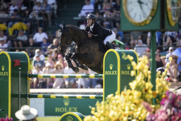 Michael Pender of Ireland and riding HHS Calais compete in the first round of the 1.60m CPKC