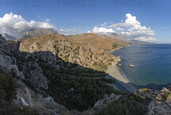 A picture of the Preveli Beach and the Preveli Palm Forest, as well as the nearby landscape and