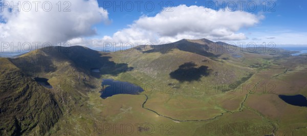 A panorama aerial view of the Mountains of the Central Dingle Peninsula and Connor Pass in County