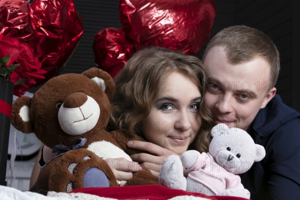 Boyfriend and girlfriend on Valentine's Day. Portrait of lovers. A man and a beautiful woman with