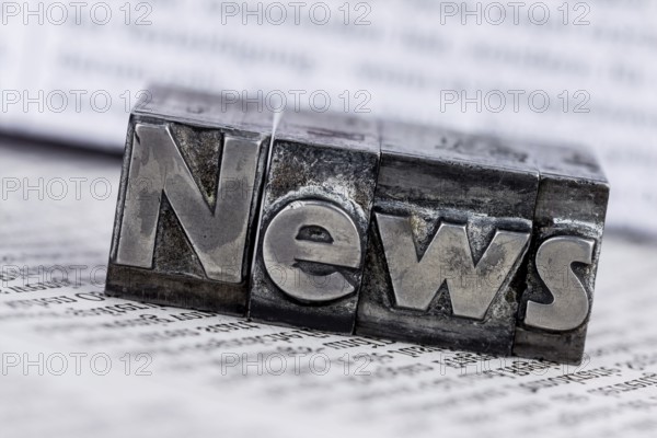 The word News was written in lead letters. Symbol photo for newsletters, newspapers and Information