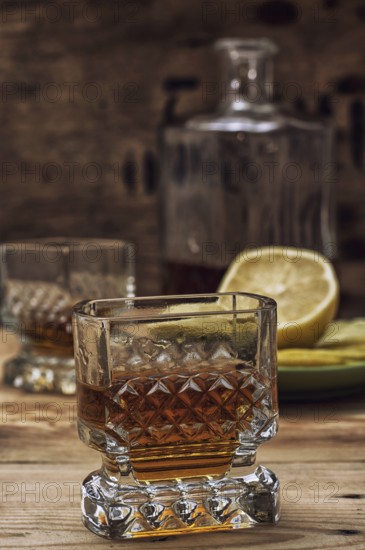 Seasoned brandy into the glasses and decanter vintage style