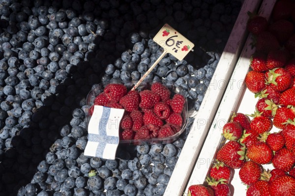 23/06/2018, Helsinki, Finland, Europe, Fresh blueberries, raspberries and strawberries are offered
