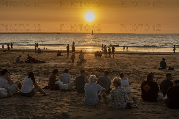 People watching the sunset on the beach, Mindil Beach, Darwin, Northern Territory, Australia,