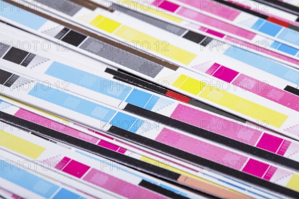 CMYK color on printed sheets of paper after cutting