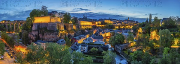 Grand Duchy of Luxembourg, night city skyline at Grund along Alzette river in the historical old