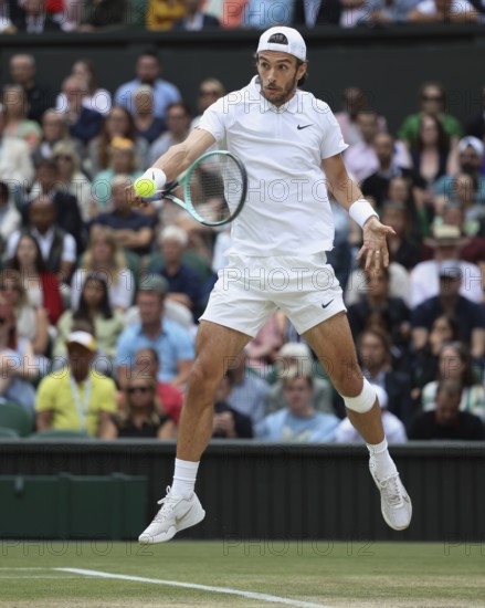 Italian tennis player Lorenzo Musetti in action at the 2024 Wimbledon Championships, London,