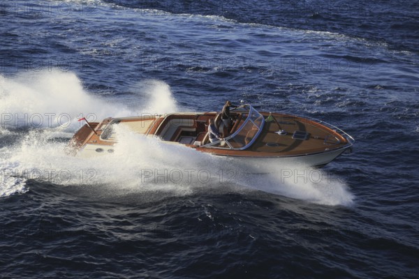 Aerial view sports boat J Craft 42 Torpedo R at full speed on the Cote d'Azur, luxury motorboat