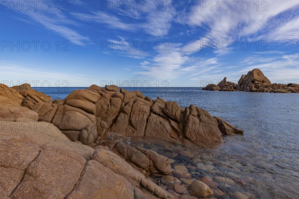 Coastal landscape with bizarre red rocks and sea view, Spiaggia di Cala E'Luas, Ogliastra,