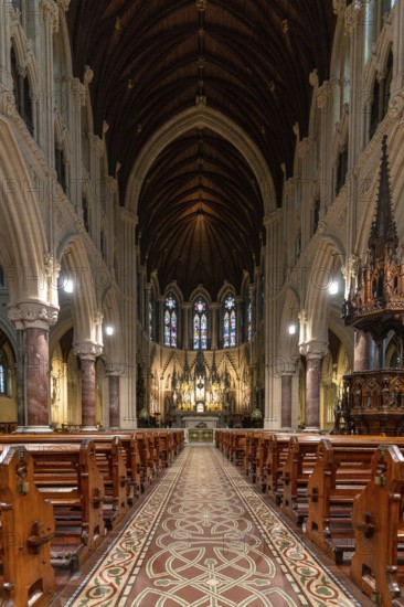 Cobh, Ireland, 15 August, 2022: vertical view of the central nave and altar inside the Cobh