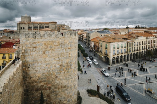 Avila, Spain, November 11, 2014: Cityscape of Avila from Medieval Walls a cloudy day. The old city