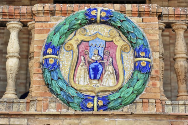 Plaza de España in Seville, Seville, Andalusia, Spain, Europe, A colourful relief of a coat of arms