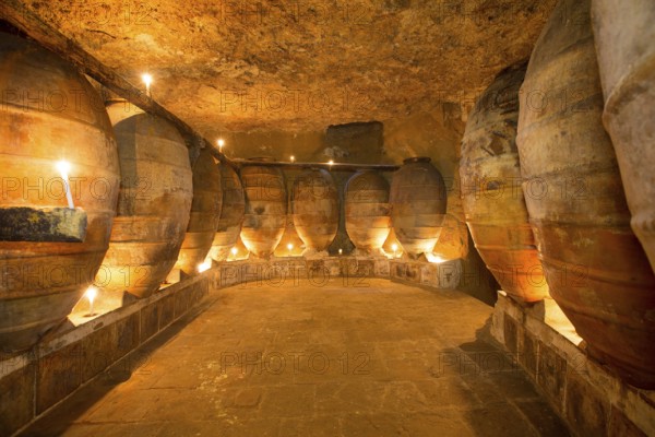 Antique winery in Spain with clay vessels terracotta amphora pots Mediterranean tradition with