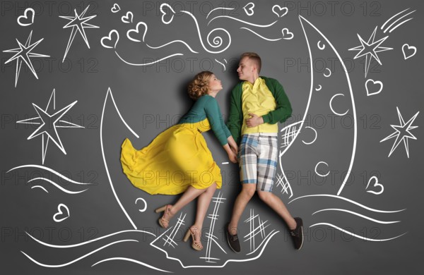 Happy valentines love story concept of a romantic couple swimming on the moon boat, holding hands