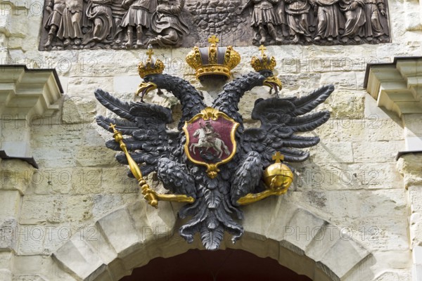 Saint Petersburg, Russia, June 12, 2019: Small State Coat of Arms of the Russian Empire on the wall