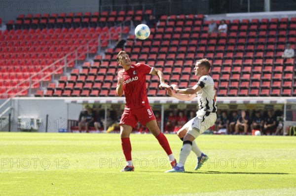 Maximilian Eggestein (SC Freiburg) wins the header duel against Fabian Frei (FC Basel) during the