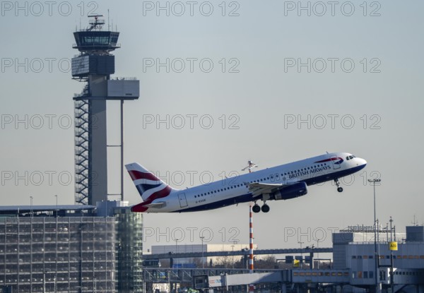 British Airways Airbus A320 aircraft taking off on the main runway south, 05R/23L, Düsseldorf