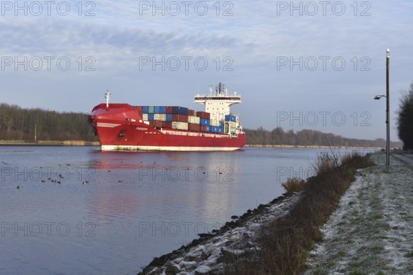 Container ship Frederik sailing in the Kiel Canal, NOK, Kiel Canal, Schleswig-Holstein, Germany,