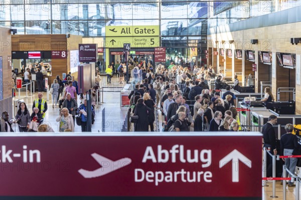 Berlin-Brandenburg BER Airport. Passengers in Terminal 1 waiting for check-in and security control