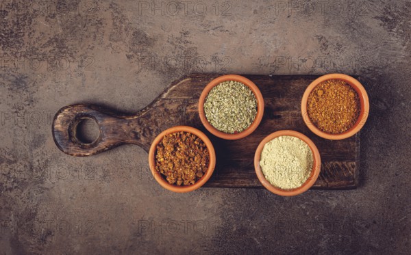 Georgian spices, in ceramic bowls, assortment, set of spices, utsho, adjika, Svan salt, ground