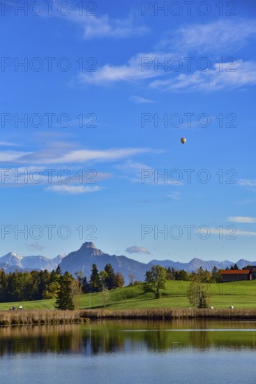 Mountain panorama at Grundweiher near Rückholz, in the background on the right Säuling (2047 m), on