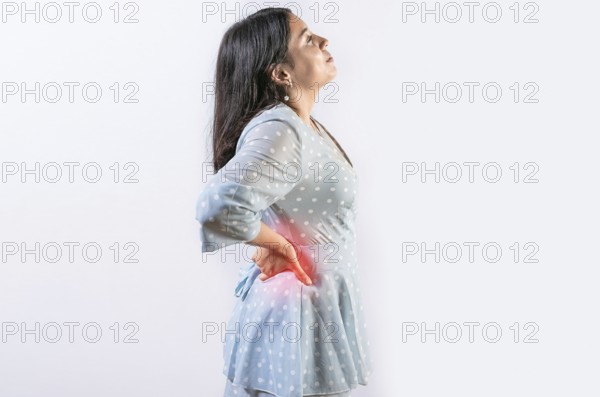 Suffering girl with back pain isolated. Young woman with spine problems isolated. Person with back