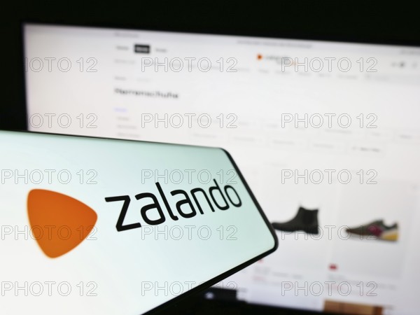 Stuttgart, Germany, 01-16-2023: Cellphone with logo of German e-commerce company Zalando SE on