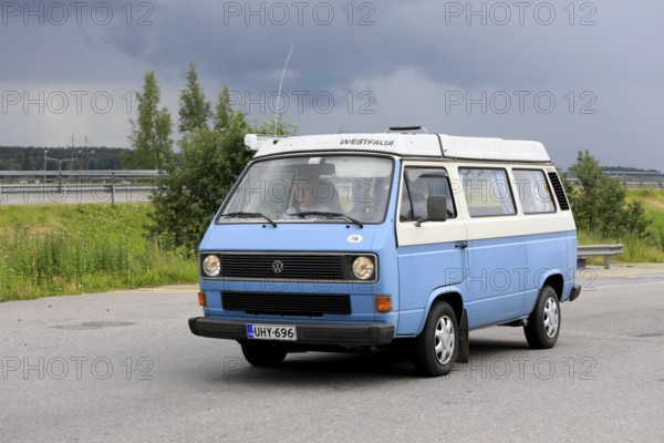 Blue Volkswagen Type 3 Westfalia camper van. The 3rd generation of VW Transporter was manufactured