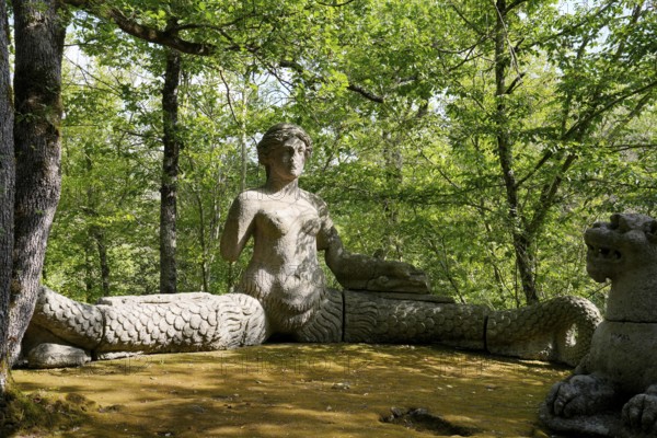 Siren and two lions, Sacro Bosco, Sacred Forest, Park of the Monsters, Parco dei Mostri, grotesque,