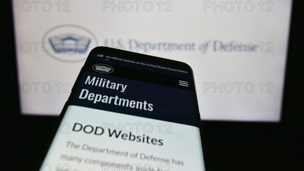 Stuttgart, Germany, 10-29-2023: Mobile phone with website of United States Department of Defense
