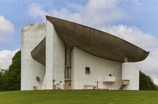 Modern church by Le Corbusier with striking concrete roof construction. Notre Dame du Haut chapel