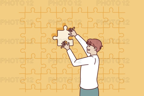 Business man putting last piece of puzzle in free space for problem solving concept. Guy in