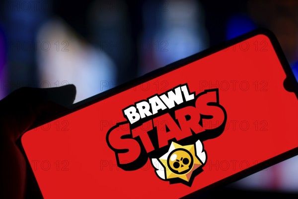 brawl stars logo is displayed on smartphone. Brawl Stars is a multiplayer online battle arena video