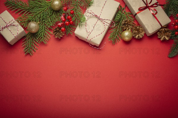 Christmas or New Year celebration red paper festive background with decoration fir tree, wrapped