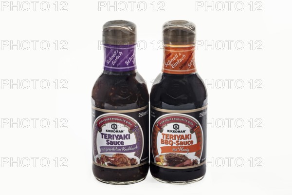 WETZLAR, Germany - 2022-07-17: Two Bottles of Kikkoman Teriyaki Sauce. In 1917 the Japanese Mogi