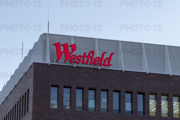 Logo, lettering on the construction site of the Westfield Hamburg-Überseequartier shopping centre,
