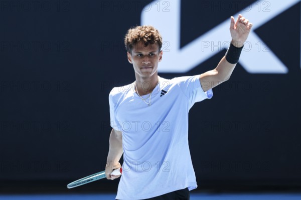 MELBOURNE, AUSTRALIA, JANUARY 11: Gabriel Diallo of Canada on his way to beating Pierre-Hugues