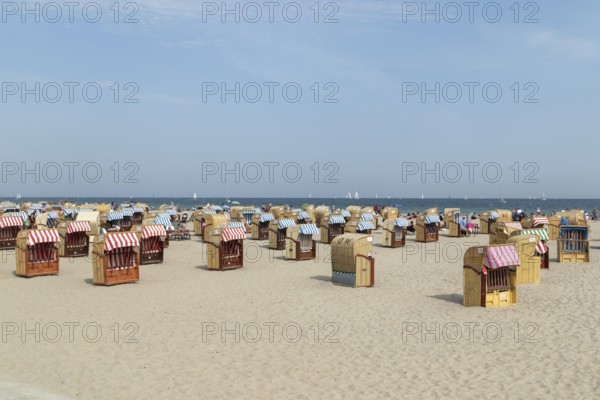 Summer weather, bathers and beach chairs on the spa beach, Travemünde beach, Hanseatic city of